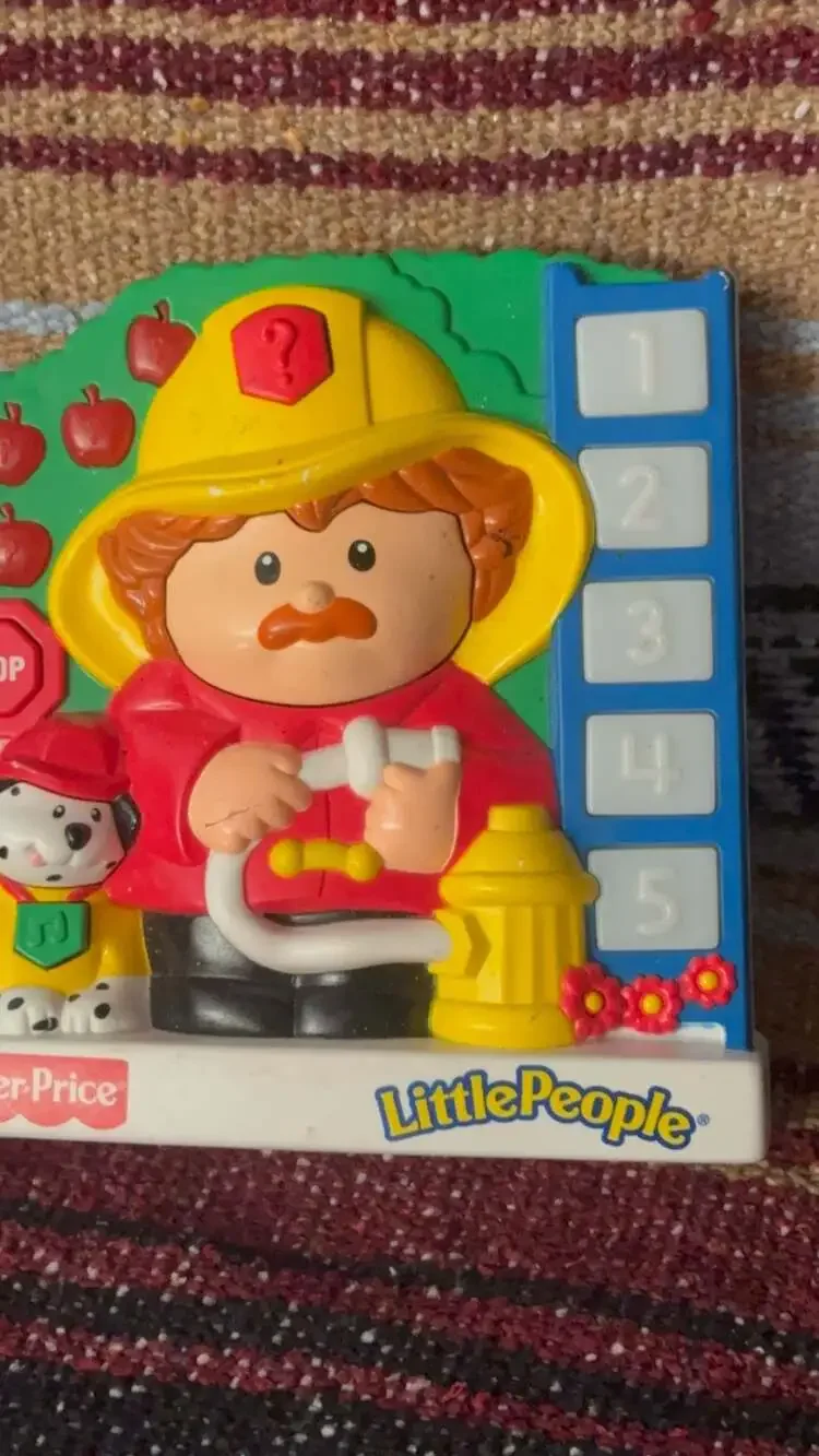 Fisher-Price Little People Growing Smart Firefighter Learning Toy
